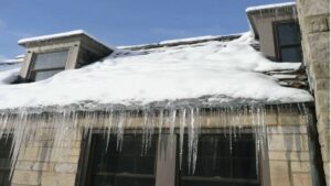 impact of heavy snowfall on roof structures