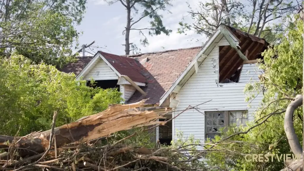severe-storm-damage-house-roof-collapse-tree-impact