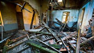 Blog 2 Storm damage inside a Pennsylvania home with collapsed roof beams and structural damage